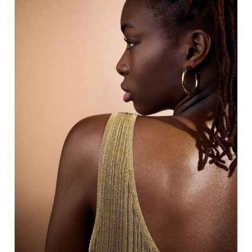 Catrice - *Wonder Woman* - Olio corpo scintillante - 020: Sassy